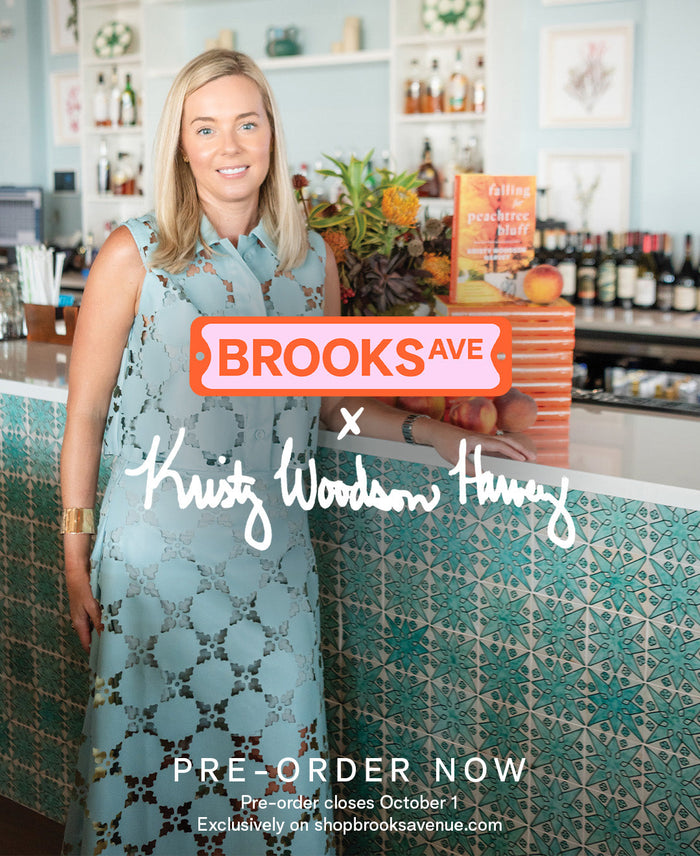 Mary Veronica Mullen in our georgia dress in frond orange