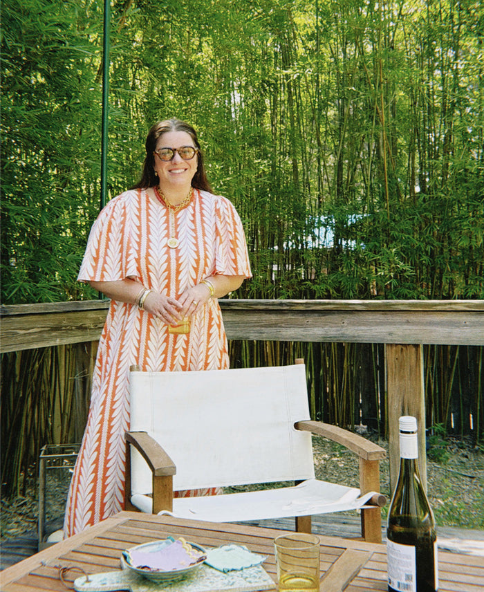 Mary Veronica Mullen in our georgia dress in frond orange